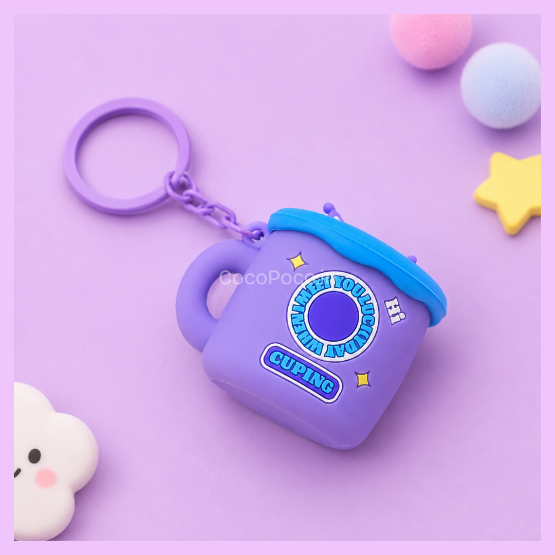 Cute Kuromi silicone pop-up keychain for backpacks, handbags, and keys on a pastel purple background.