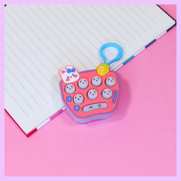 Pink game inspired keychain