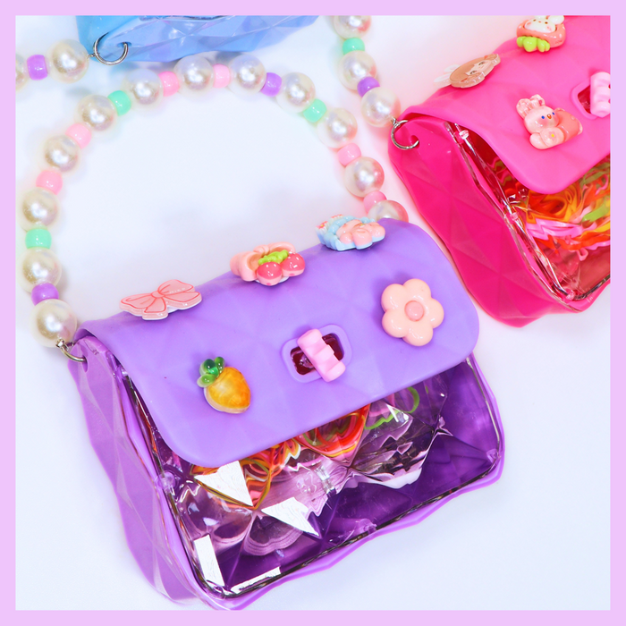Hair accessories set in purple purse case