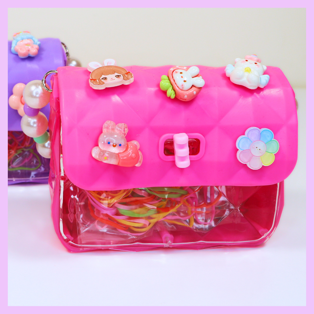 Hair accessories set in pink purse case