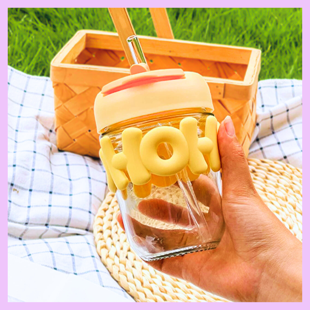 Glass coffee cup with reusable glass straw