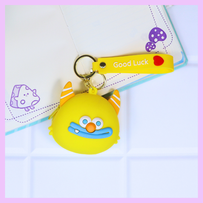 Yellow monster silicone coin pouch