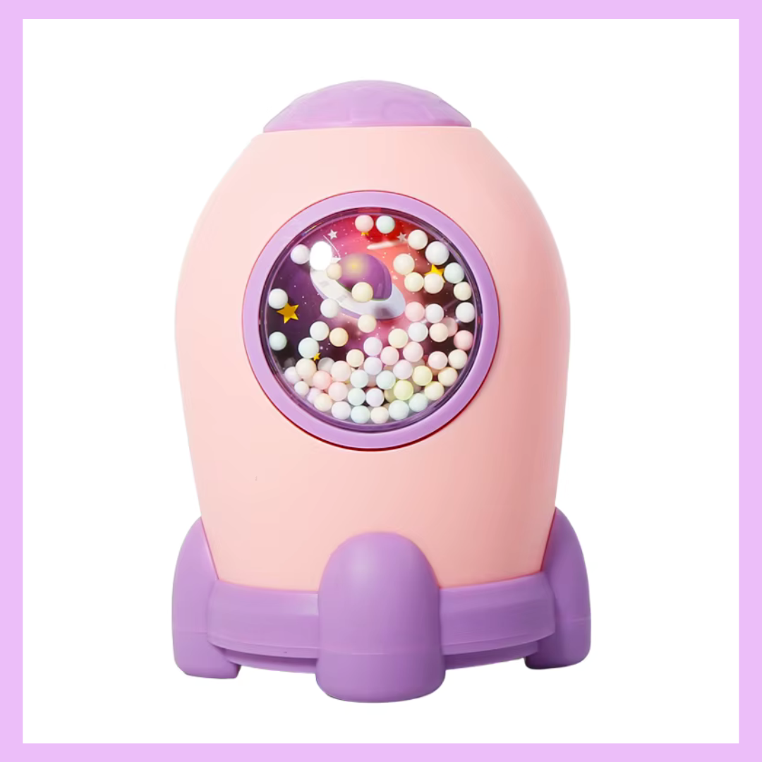 Pink rocket piggy bank