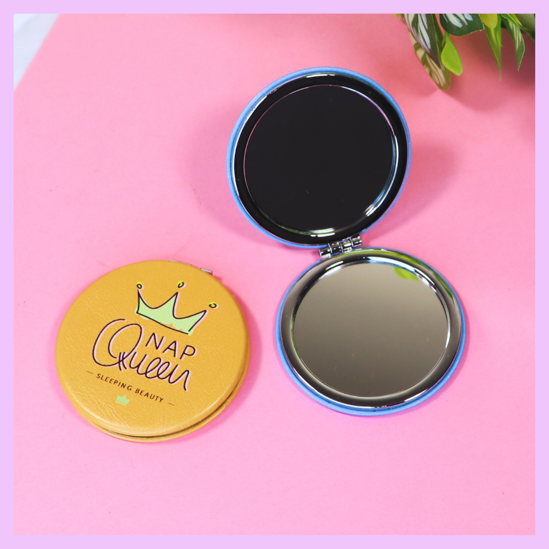 Round pocket mirror with Nap Queen design
