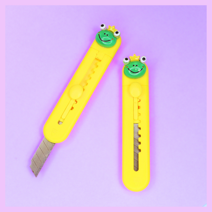 Fancy frog paper cutter in yellow