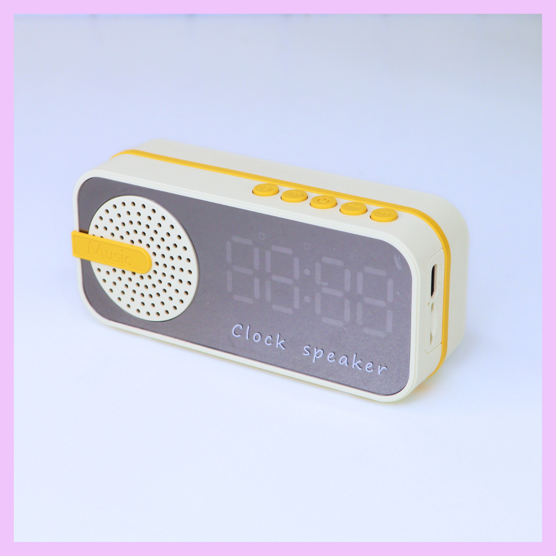 Beige digital clock with speaker