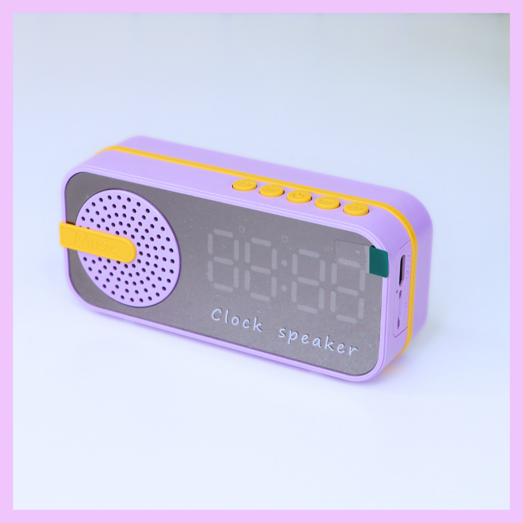 Purple digital clock with speaker
